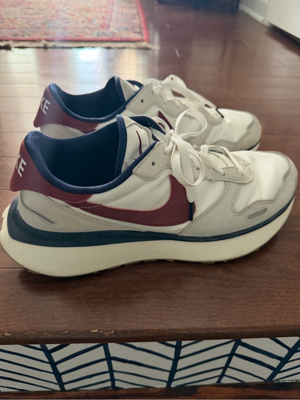 Nike White Sneakers with Maroon Swoosh and Navy Collar